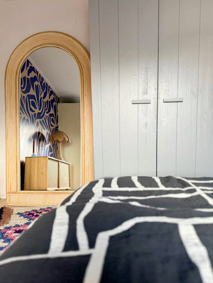 Rattan floor mirror